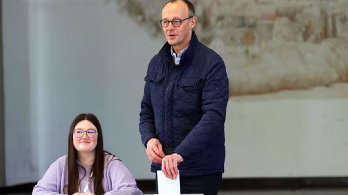 Friedrich Merz, CDU leader, votes at a polling station in Arnsberg-Niedereimer, Germany, on Feb. 23, 2025. (Image Source: AP)