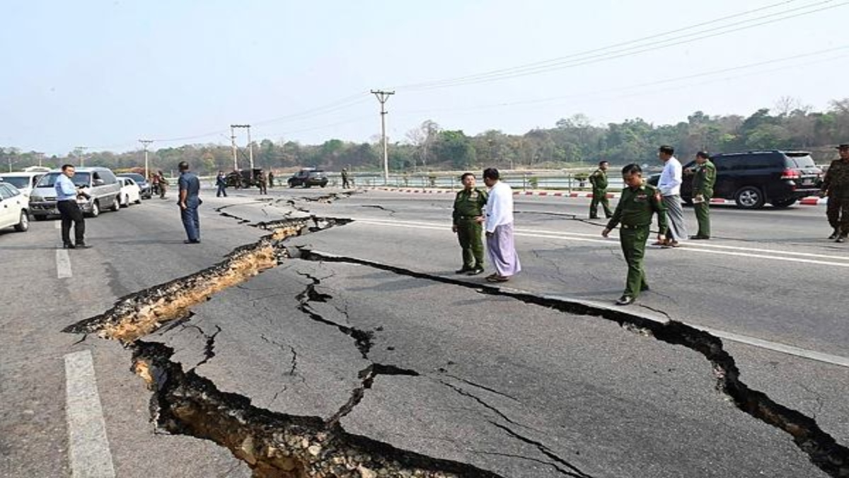 In this image provided by The Myanmar Military True News Information Team, Myanmar's military leader Senior Gen. Min Aung Hlaing, center, inspects damaged road caused by an earthquake Friday, March 28, 2025, in Naypyitaw, Myanmar. (The Myanmar Military True News Information Team via AP)AP/PTI(AP03_28_2025_000504A)