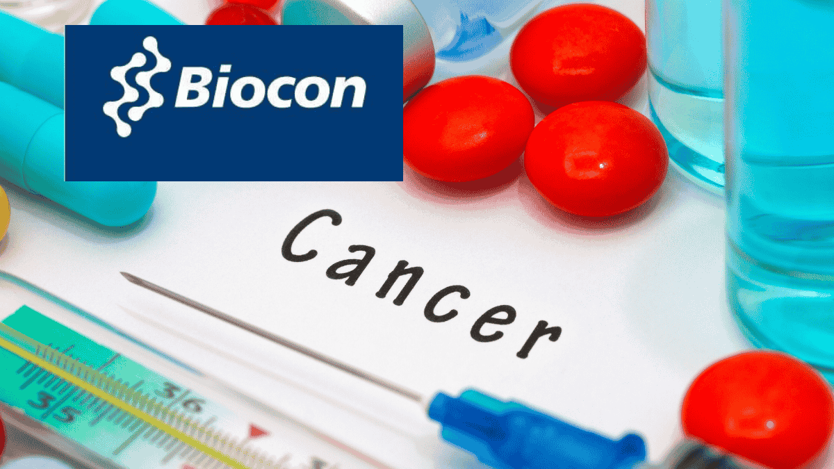 Biocon Biologics and NCSM officials signing MoU to launch cancer care program in Malaysia. (Image: Canva)