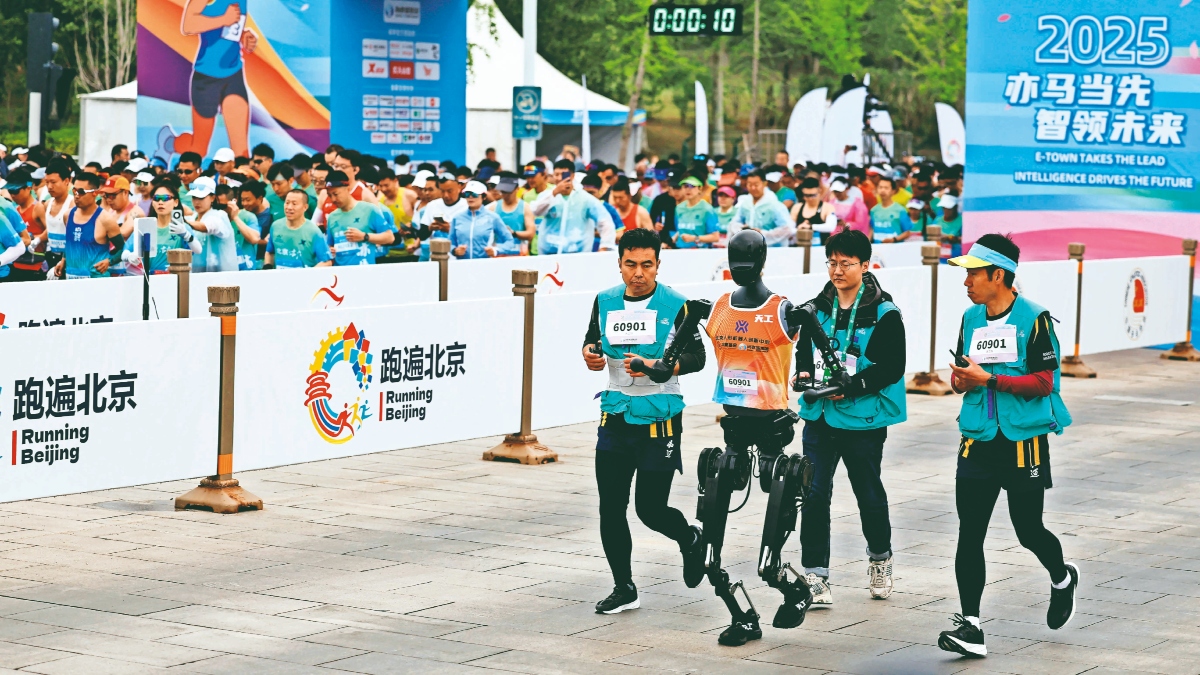 Humanoid robot Tiangong Ultra in the humanoid robot half marathon in Beijing, China. Credit: Reuters