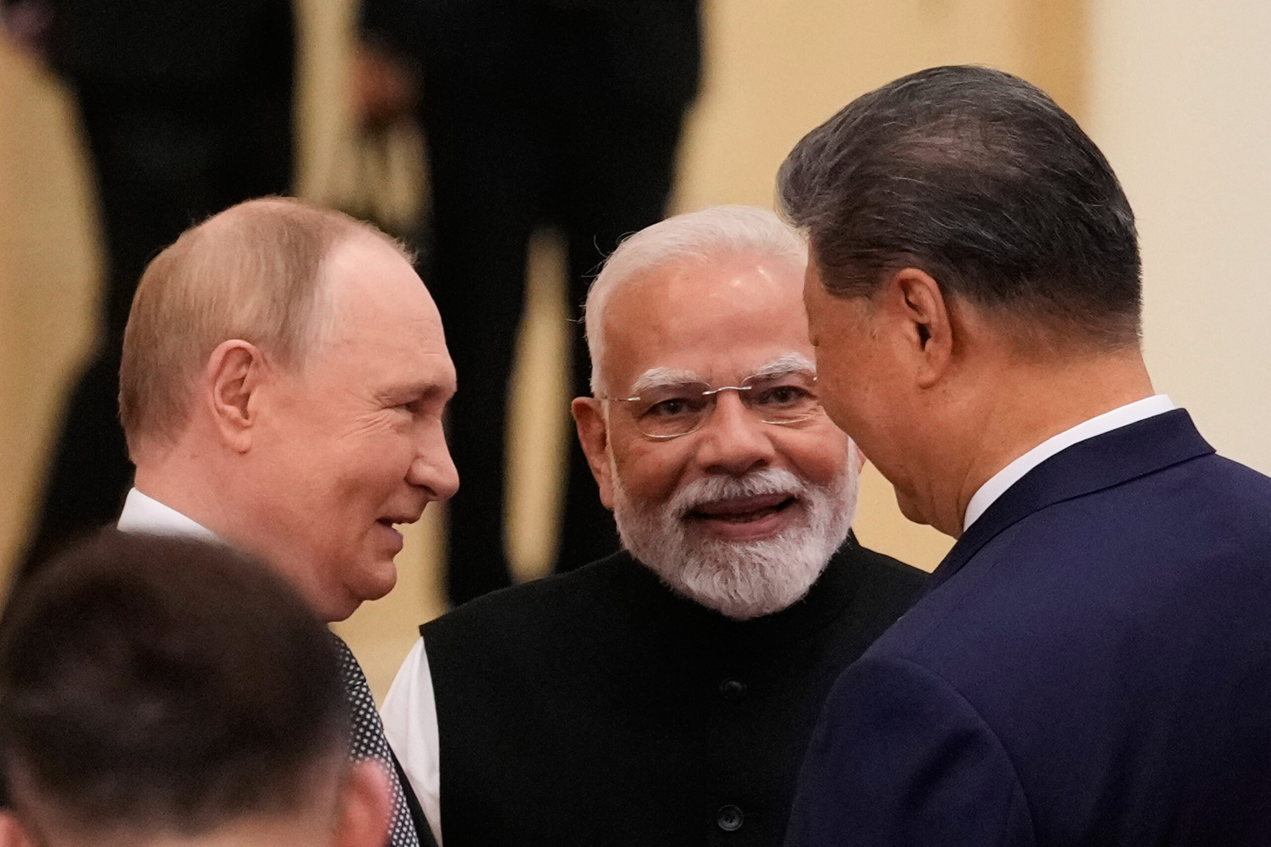 Russian President Vladimir Putin, from left, Indian Prime Minister Narendra Modi and Chinese President Xi Jinping talk ahead of the SCO summit (Photo: AP/PTI)