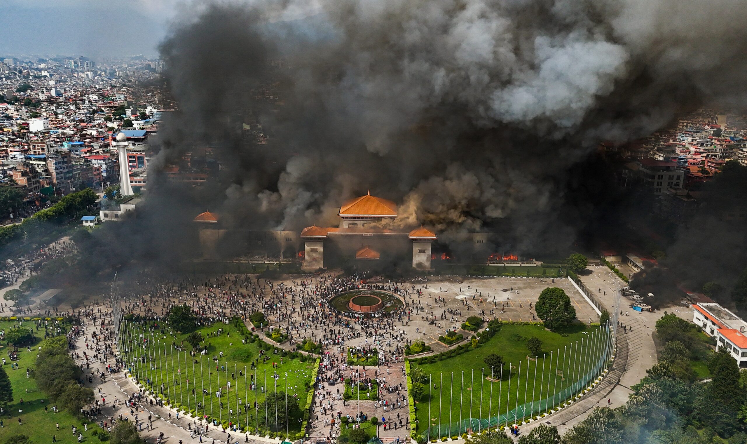 An aerial view of smoke rising from the Federal Parliament of Nepal premises after it was set on fire by protestors during massive anti-government protests (Photo: PTI)
